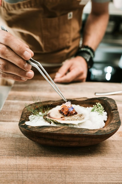 Chef preparing a rustic dish